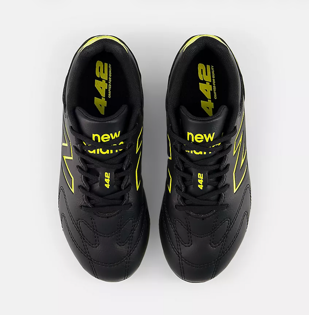 New Balance 442 Team FG V3 Kid's Football Shoes – Black with Punchy Yellow (F M Medium Fit)